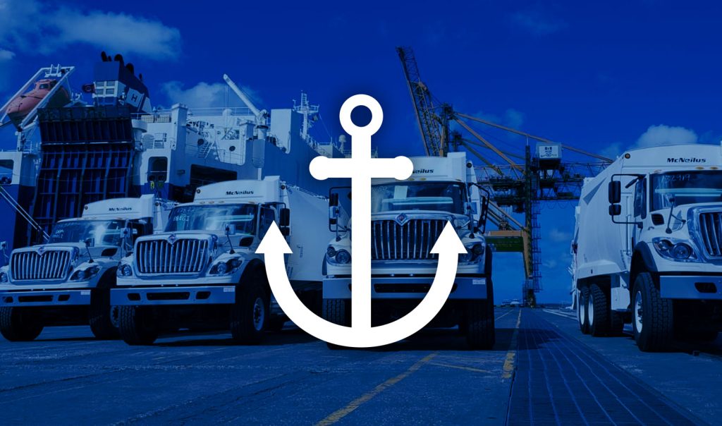 Icon of a boat ink on an Image of heavy vehicles in a port illustrating Transteck Canada's port vehicle delivery service